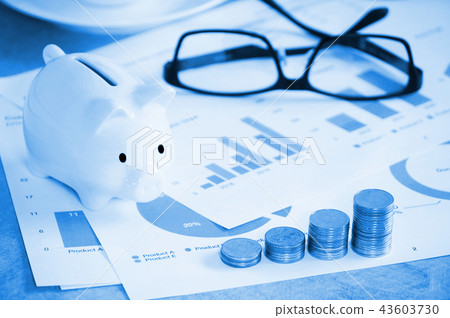 Blue theme stack coin and piggy on document  43603730