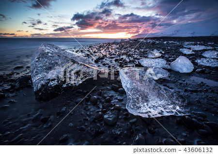 Icebergs in Jokulsarlon glacial lake during sunset, Iceland Icebergs in Jokulsarlon glacial lake during sunset, Iceland 43606132