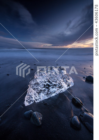 Icebergs in Jokulsarlon glacial lake during sunset, Iceland Icebergs in Jokulsarlon glacial lake during sunset, Iceland 43606178