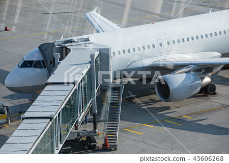 View from airport look-out tower on jet plane on the runway. 43606268