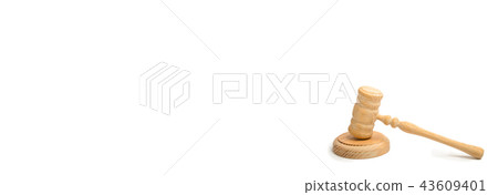 Wooden judge hammer on a white background.  43609401