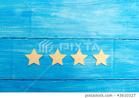 four stars on a blue background four stars on a blue background 43610327