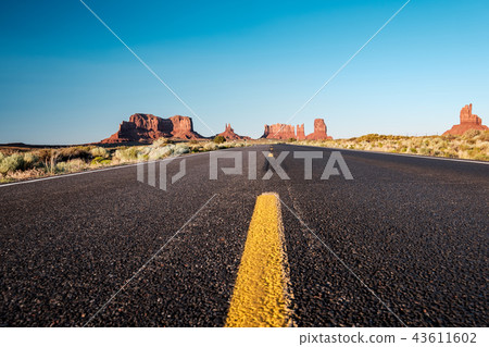 Empty scenic highway in Monument Valley Empty scenic highway in Monument Valley 43611602