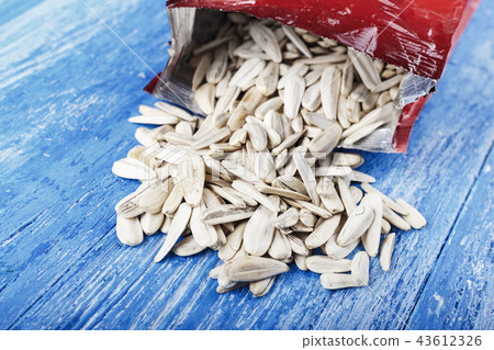 white sunflower seeds scattered 43612326