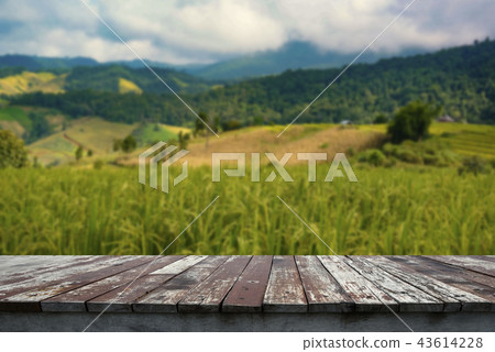 Old wooden floor and blurry paddy field 43614228
