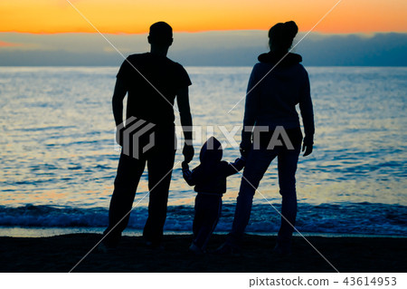 family at sunset by the sea family at sunset by the sea 43614953