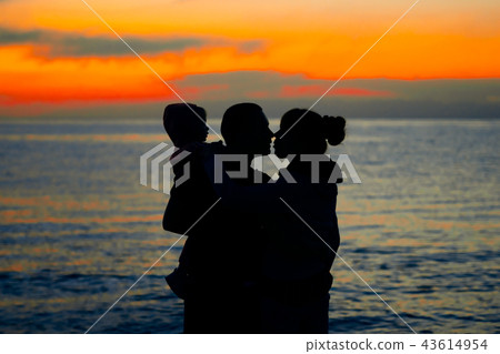 family at sunset by the sea family at sunset by the sea 43614954