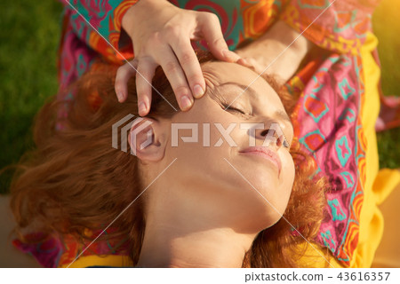 Close up woman's head massaging. Close up woman's head massaging. 43616357