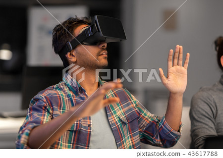 creative man in virtual reality headset at office 43617788