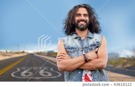 smiling hippie man in denim vest over us route 66 smiling hippie man in denim vest over us route 66 43618122