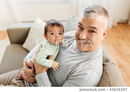 happy father with little baby boy at home 43618307