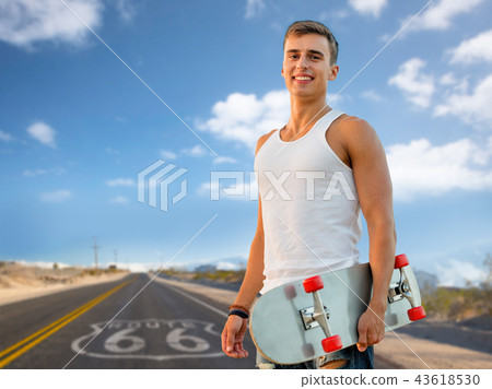 man with skateboard over us route 66 background man with skateboard over us route 66 background 43618530