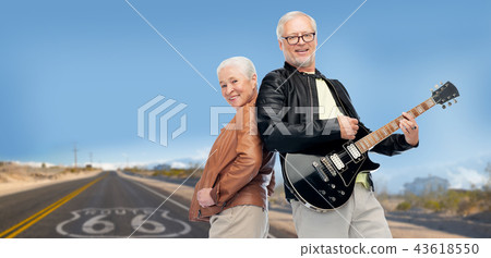 senior couple with electric guitar over route 66 senior couple with electric guitar over route 66 43618550