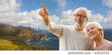 happy senior couple over big sur coast happy senior couple over big sur coast 43618552