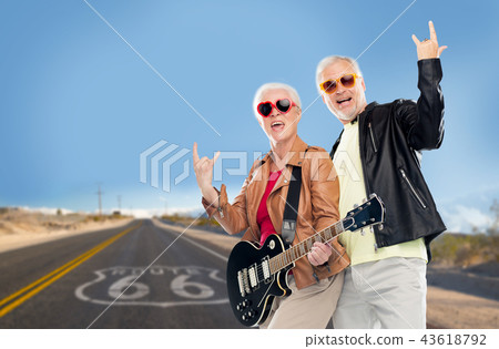 senior couple with electric guitar over route 66 senior couple with electric guitar over route 66 43618792