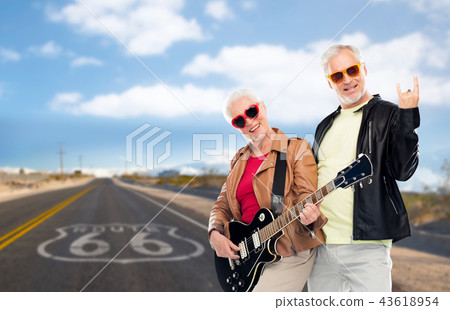senior couple with electric guitar over route 66 43618954
