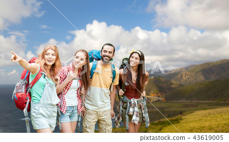 group of friends with backpacks on big sur coast 43619005