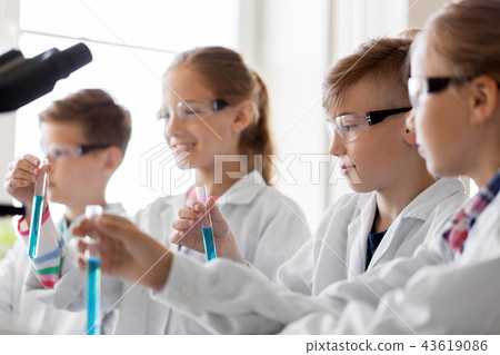 kids with test tubes studying chemistry at school kids with test tubes studying chemistry at school 43619086