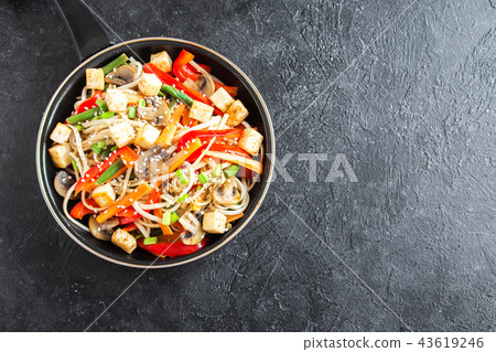 Stir fry with noodles, tofu and vegetables Stir fry with noodles, tofu and vegetables 43619246