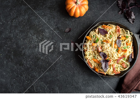 Autumn pasta with pumpkin and bacon Autumn pasta with pumpkin and bacon 43619347