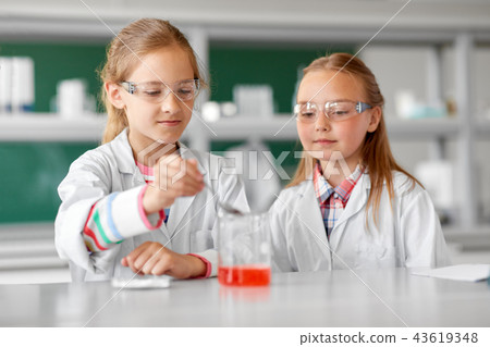 kids with test tube studying chemistry at school kids with test tube studying chemistry at school 43619348