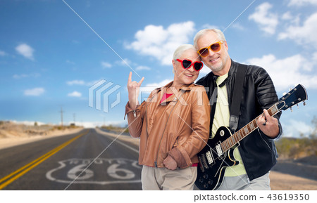 senior couple with electric guitar over route 66 senior couple with electric guitar over route 66 43619350