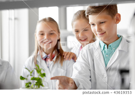 kids or students with plant at biology class 43619353