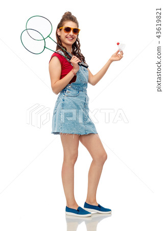 teenager with badminton rackets and shuttlecock teenager with badminton rackets and shuttlecock 43619821