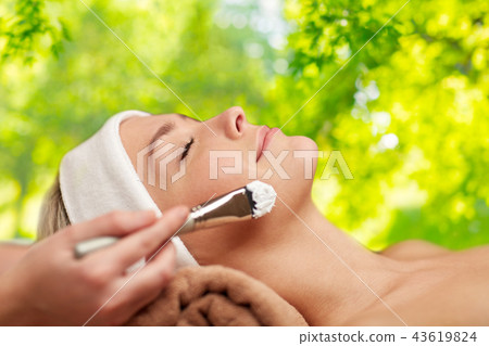 close up of young woman and cosmetologist in spa close up of young woman and cosmetologist in spa 43619824