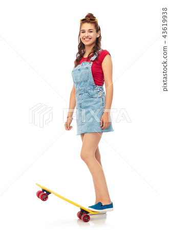 smiling teenage girl with skateboard over white 43619938