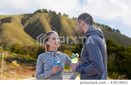couple of sportsmen with water over big sur hills couple of sportsmen with water over big sur hills 43619941