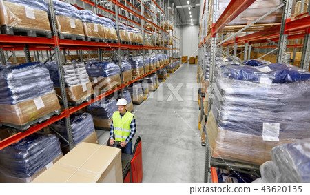 loader operating forklift at warehouse loader operating forklift at warehouse 43620135