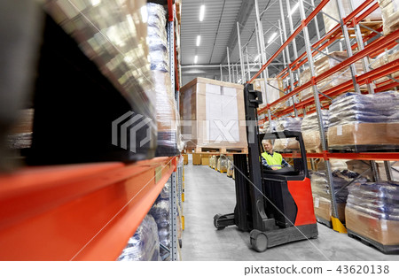 loader operating forklift at warehouse loader operating forklift at warehouse 43620138