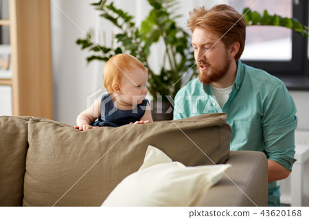 happy father with little baby daughter at home happy father with little baby daughter at home 43620168