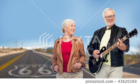 senior couple with electric guitar over route 66 43620169