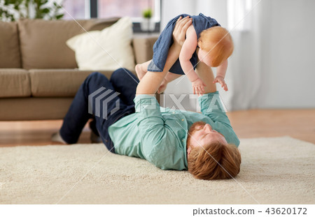 happy father with little baby girl at home 43620172