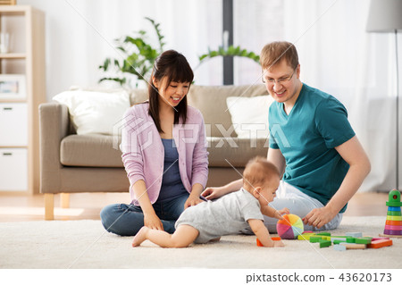 happy family with baby boy playing at home 43620173