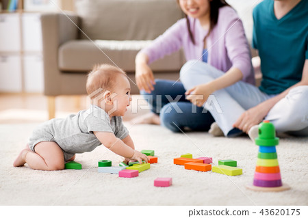 happy family with baby boy playing at home happy family with baby boy playing at home 43620175