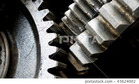 close up gear wheel rotate concept. spare part 43624002
