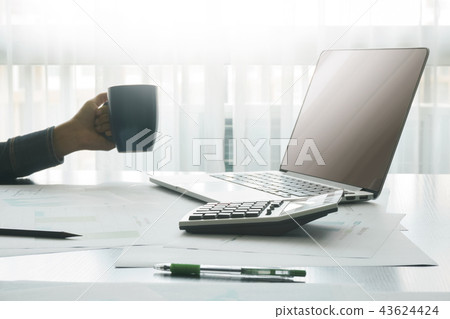accountant working with tools on wooden table accountant working with tools on wooden table 43624424