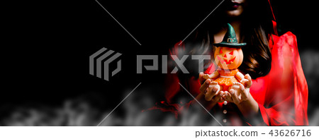 Happy Halloween. women holding pumpkin toy. 43626716