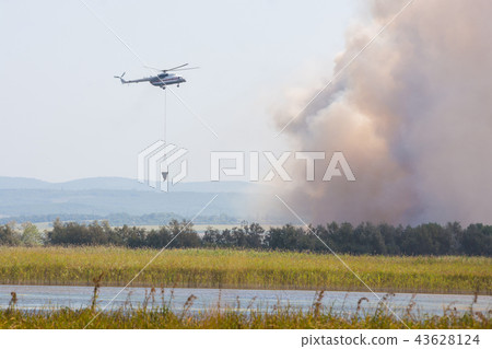 Fire extinguishing using a helicopter MI8 Fire extinguishing using a helicopter MI8 43628124
