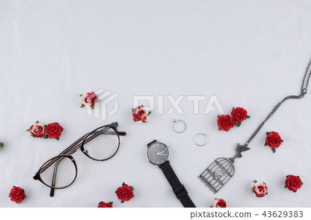 Eyeglasses, black watches, necklace and rings 43629383