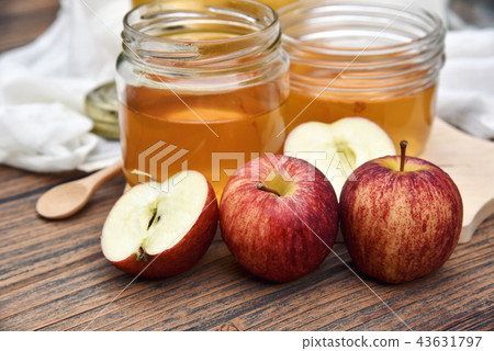 Apple cider vinegar on wooden board, Kombucha. 43631797