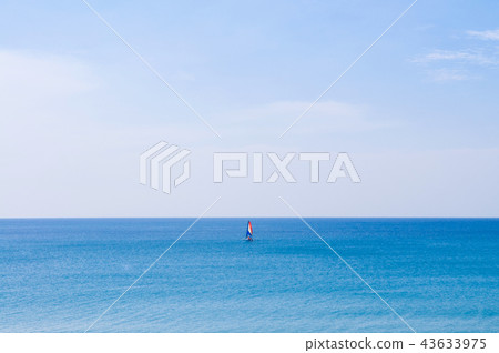 Phuket vibrant blue sea at Mai Khao beach Sailboat Phuket vibrant blue sea at Mai Khao beach Sailboat 43633975