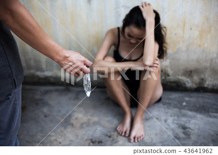condom with semen and sad prostitute girl 43641962