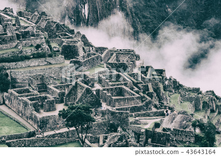 Ancient ruins of Machu Picchu and the mountains. Ancient ruins of Machu Picchu and the mountains. 43643164