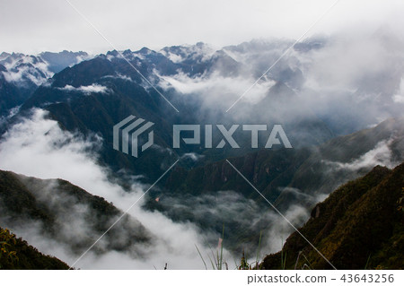 Magical view of the mountains in mist. Magical view of the mountains in mist. 43643256