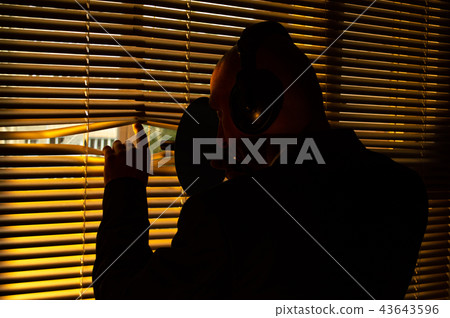 FBI agent eavesdropping on a directional microphon 43643596