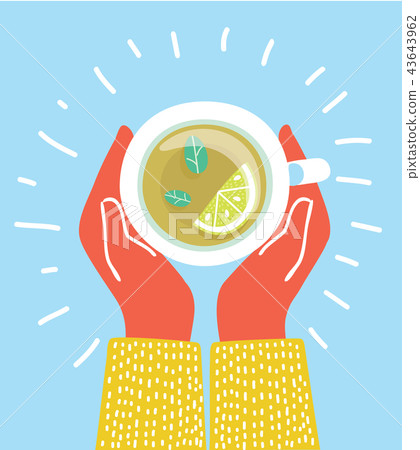 Cup of tea in hands. Brewed herbal tea with lemon. 43643962